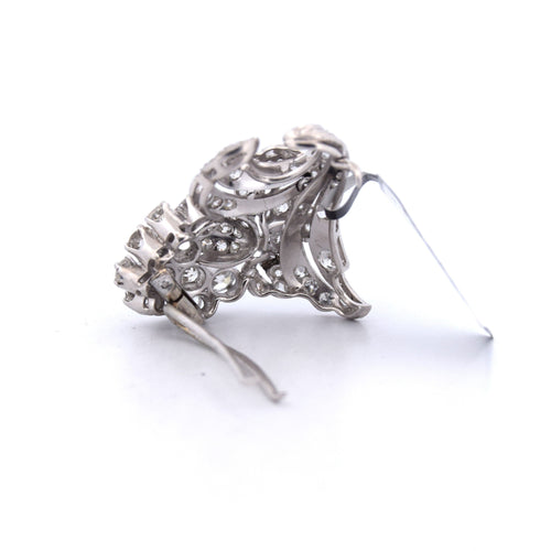 Broche Broche ancienne en or blanc 18 carats 58 Facettes