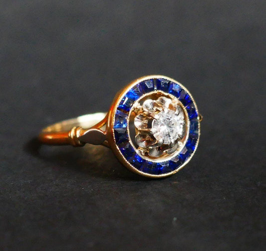 Bague 55.5 Bague ornée d'un Diamant, entourage de Saphirs calibrés 58 Facettes C49-02