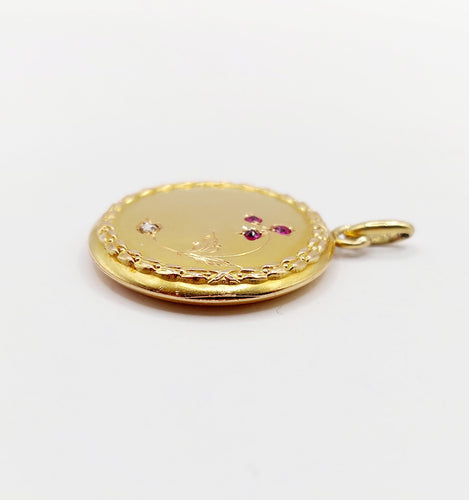 Pendentif Pendentif porte-photo antique fleur en or 18k avec diamant et rubis vers 1910 58 Facettes A06431