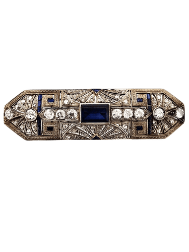 Broche Broche en or blanc, saphirs et diamants 58 Facettes