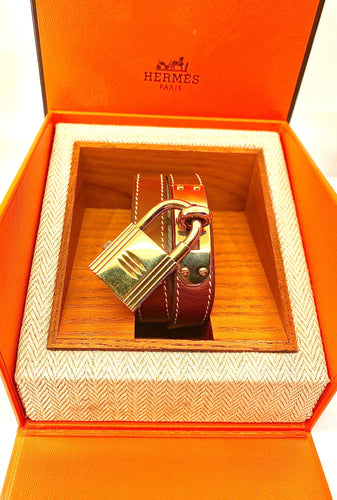 Montre Montre Hermès «  Kelly », cadran PM plaqué or, double tour cuir marron 58 Facettes AB453