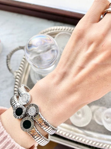 Bracelet BULGARI  - Bracelet Bvlgari acier et onyx 58 Facettes