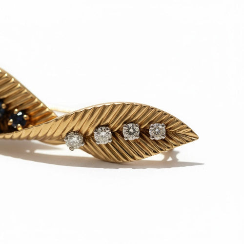 Broche Van Cleef & Arpels - Broche Feuille - Or jaune et Platine - Saphirs et Diamants 58 Facettes 1.0001076/1