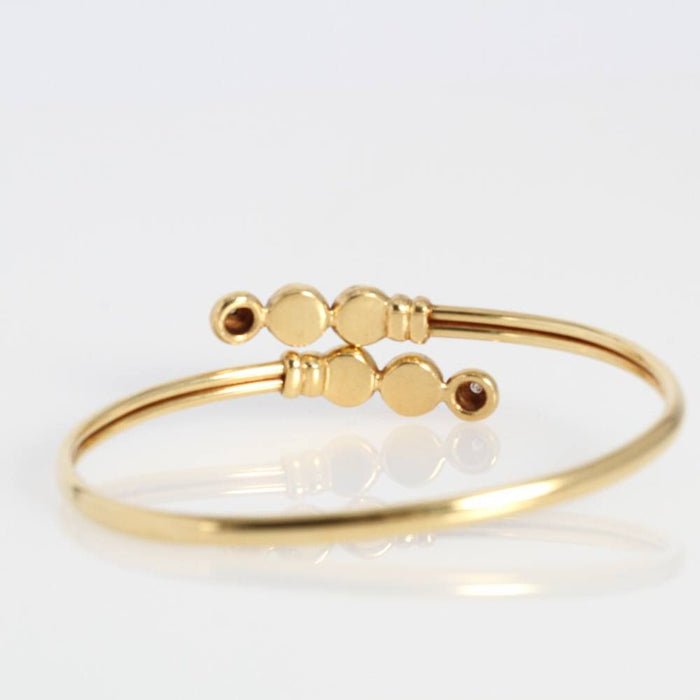 pulsera de oro con perlas y diamantes