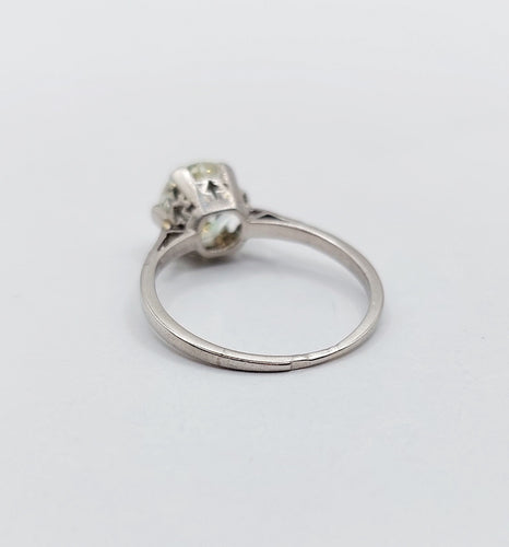 Bague 48 Bague solitaire art déco, platine et diamants 58 Facettes A05538