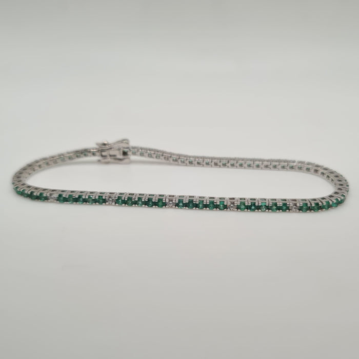 Bracelet Rivière or blanc sertie de diamants et émeraudes 58 Facettes