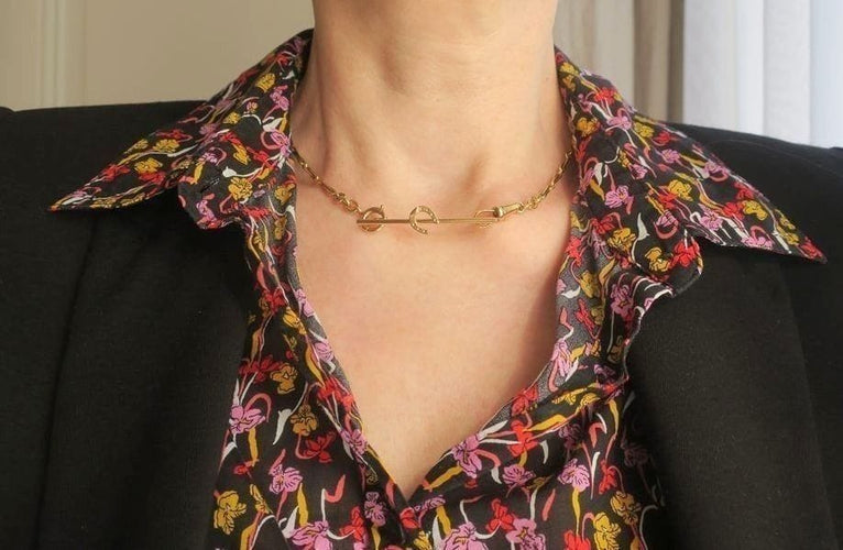 Broche Broche barrette fer à cheval en or jaune 58 Facettes