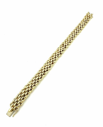 Bracelet CHAUMET. Bracelet vintage or jaune 18K 58 Facettes