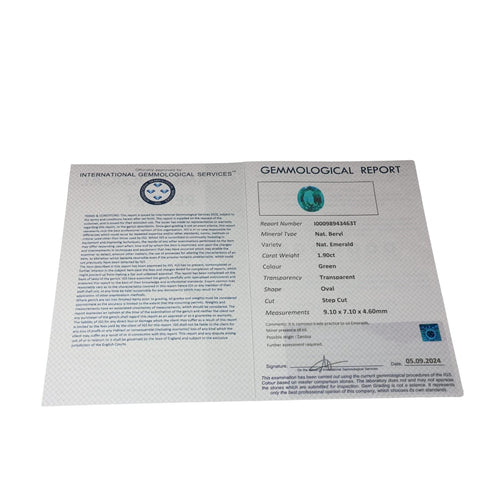 Bague 56 Bague en or blanc avec émeraude centrale et diamants 58 Facettes