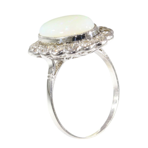 Bague 60 Élégance classique : le charme intemporel d’une bague en opale vintage des années 1950 58 Facettes 17226-0017