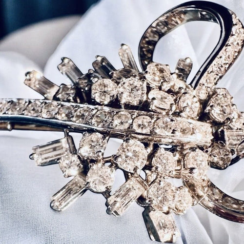 Broche Broche Art Déco en or gris, platine, diamants 58 Facettes