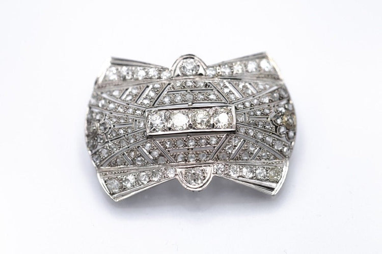 Broche Broche Art déco en platine et diamants 6,85 ct 58 Facettes PLT7