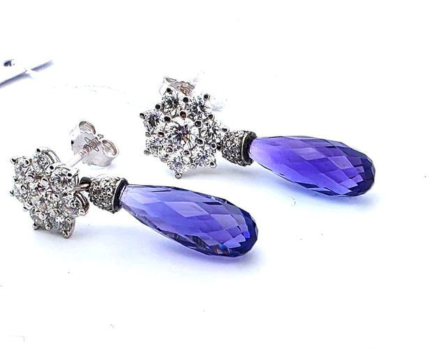Boucles d'oreilles Boucles d'oreilles en or blanc serties de diamants et de tanzanite 58 Facettes