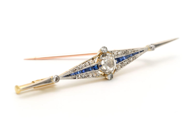 Broche Broche Art Déco en or blanc et jaune sertie de saphirs et de diamants 58 Facettes 22395
