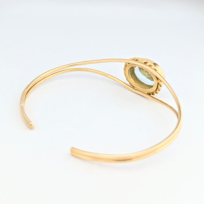 Bracciale bangle in oro giallo e acquamarina