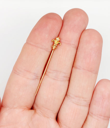 Antik roséguld fleur-de-lis slips eller halsduksnål (cirka 1900)