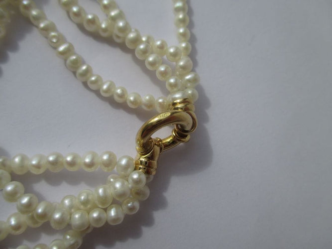 Bracelet Bracelet quatre rangs perles de culture 58 Facettes