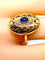 Bague Bague en or jaune 18 carats ,saphir cabochon et diamants 58 Facettes AB232