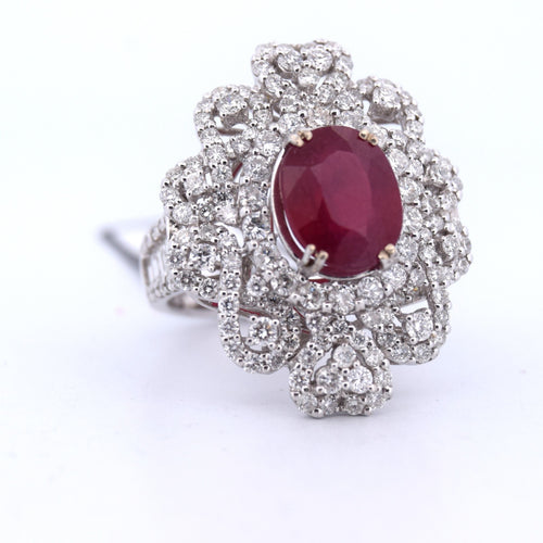 Bague 54 Bague en or blanc avec rubis, diamants et baguettes 58 Facettes