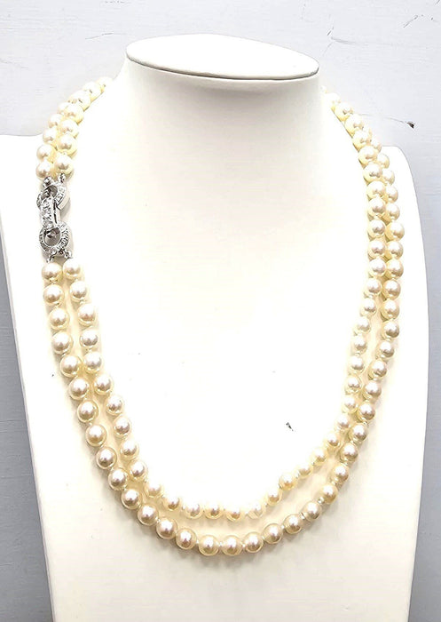 Collier Collier de perles avec fermeture en or blanc et diamants 58 Facettes