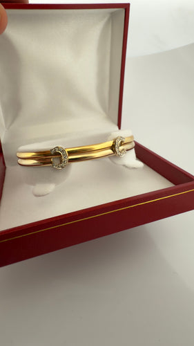 Bracelet Bracelet Cartier vintage double C en or et diamants 58 Facettes