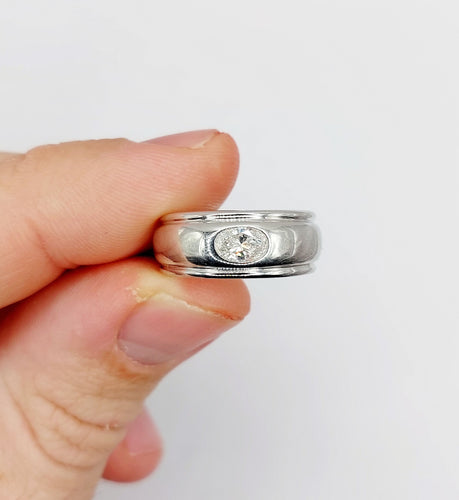 Bague 51 Boucheron - Bague Axelle bombée en or blanc 18k et diamant ovale 0,40 carat 58 Facettes A06571