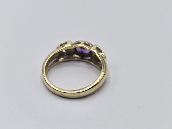 Bague 54 Bague OR Jaune 14k sertie d'une tourmaline au centre et d'éclats de diamants sur les côtés 58 Facettes 1-0000437/5