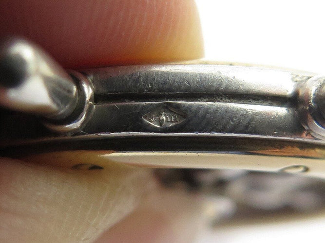 Pendentif rare vintage pendentif HERMES barre a roue en argent 800 & or jaune 18k 24.8 gr 58 Facettes 268491