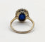 Bague 50.5 Bague Pompadour deux ors ornée d'une pierre bleue et de diamants 58 Facettes