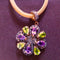 Pendentif Pendentif or et argent avec améthystes, péridots et diamants 58 Facettes R 650  Rie
