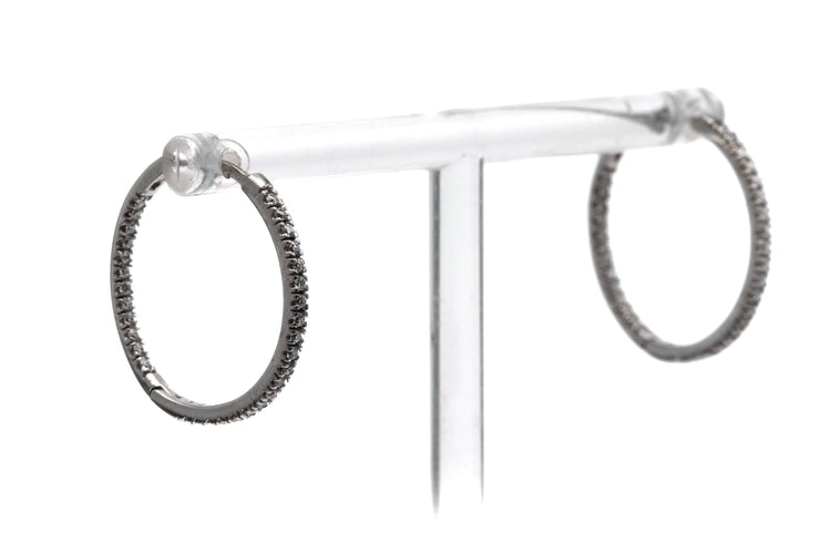 Boucles d'oreilles Créoles contemporaines en or blanc 18 carats serties de diamants taille brillant 0,64 ct 58 Facettes 23087