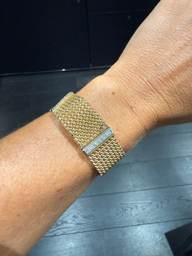 Montre Bracelet Montre Ruban Tressé - Or jaune et Diamants 58 Facettes 1.0000912/1