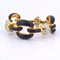 Bracelet David Webb - Bracelet à mailles en or jaune 18k, smalto nero et diamants 58 Facettes BR112