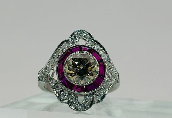 Platinum ring with diamonds and rubies. Art Deco style. 