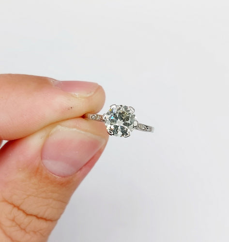 Bague 48 Bague solitaire art déco, platine et diamants 58 Facettes A05538