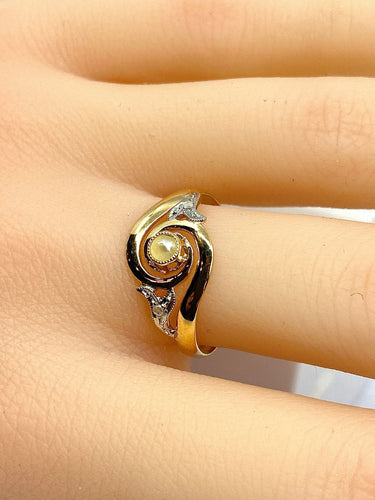 Bague 58 Bague en or jaune en perle et diamants sertis en or blanc 58 Facettes AB584