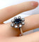 Bague 53 Bague marguerite en or blanc, saphir et diamants 58 Facettes AB644
