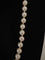 Collier Collier 71 perles de culture blanche fermoir or 58 Facettes