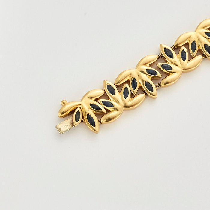 CHAUMET - Armband aus Gelbgold, verziert mit Saphiren