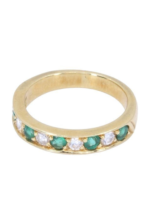 Emerald and diamond half wedding ring