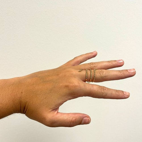 Yellow gold and diamond spiral ring