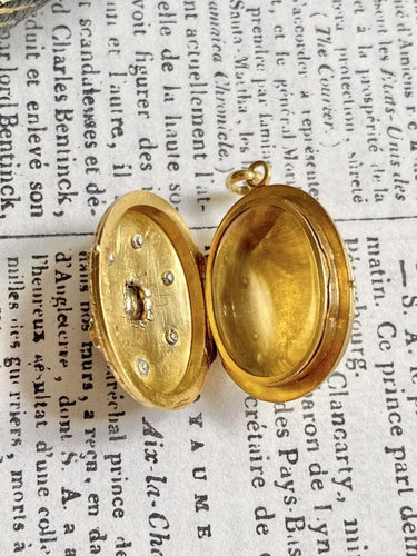 Pendentif Médaillon porte-photo en or jaune 58 Facettes