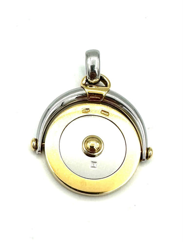 Pendentif BVLGARI. Pendentif vintage or et acier 58 Facettes