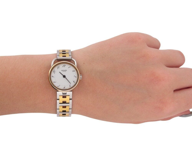 Montre vintage montre HERMES arceau 25 mm acier et plaque or quartz  plated 58 Facettes 268618