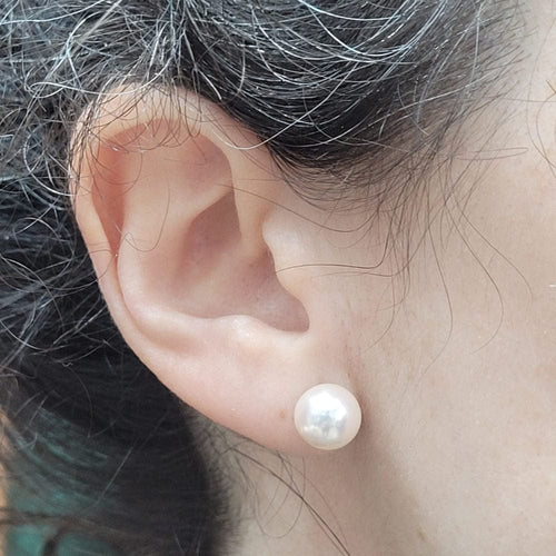 Boucles d'oreilles Boucles d'oreilles en perles avec une étoile en diamants, en or blanc et jaune 18 carats 58 Facettes PE238TA159