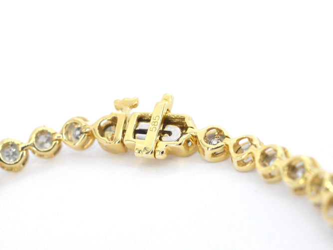 Bracelet Bracelet en or jaune serti de diamants 58 Facettes 2172