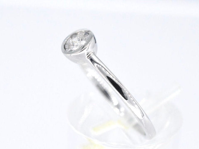 Bague Bague en or blanc avec un diamant taille brillant 58 Facettes 2088