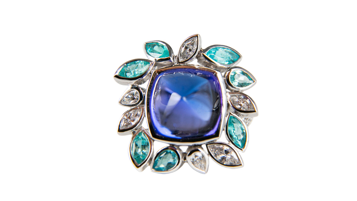 Precious ring in white gold, tanzanite, paraiba tourmalines