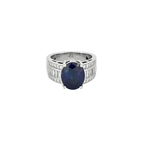 Bague 53 Bague en or blanc, saphir central et diamants 58 Facettes