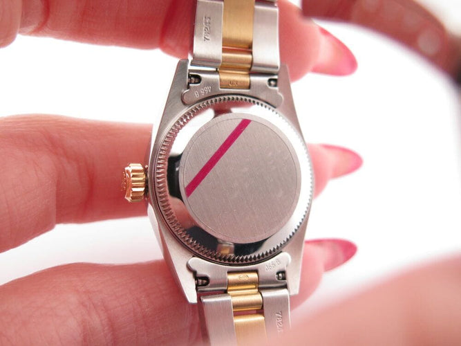 Montre vintage montre ROLEX 76183 oyster perpetual lady or & acier garantie auto 58 Facettes 265437